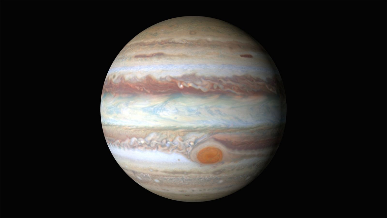 Júpiter es, después del Sol, el mayor cuerpo celeste del sistema solar, con una masa casi dos veces y media la de los demás planetas juntos.