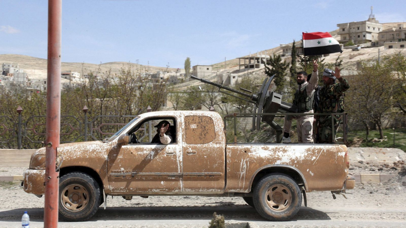 Soldados del ejército sirio en la ciudad de al-Sarkha cerca de la capital, Damasco (imagen archivo)