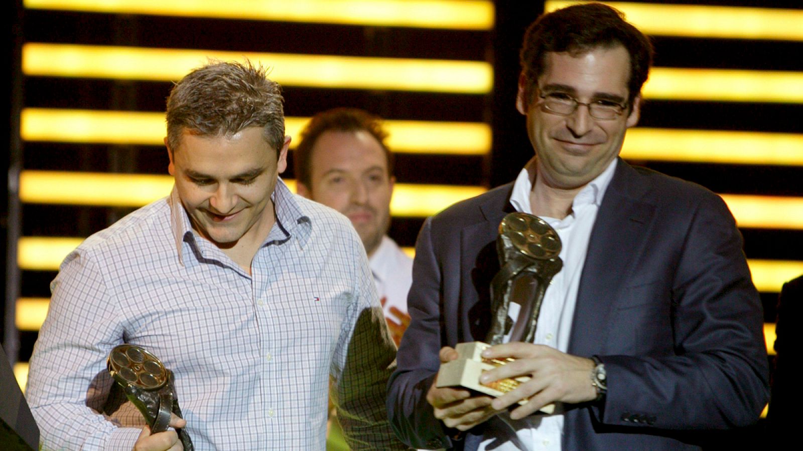 Ignacio Pérez Dolset (derecha), socio del Grupo Zed, recoge un premio como productor de la película de animación 'Planet 51'.