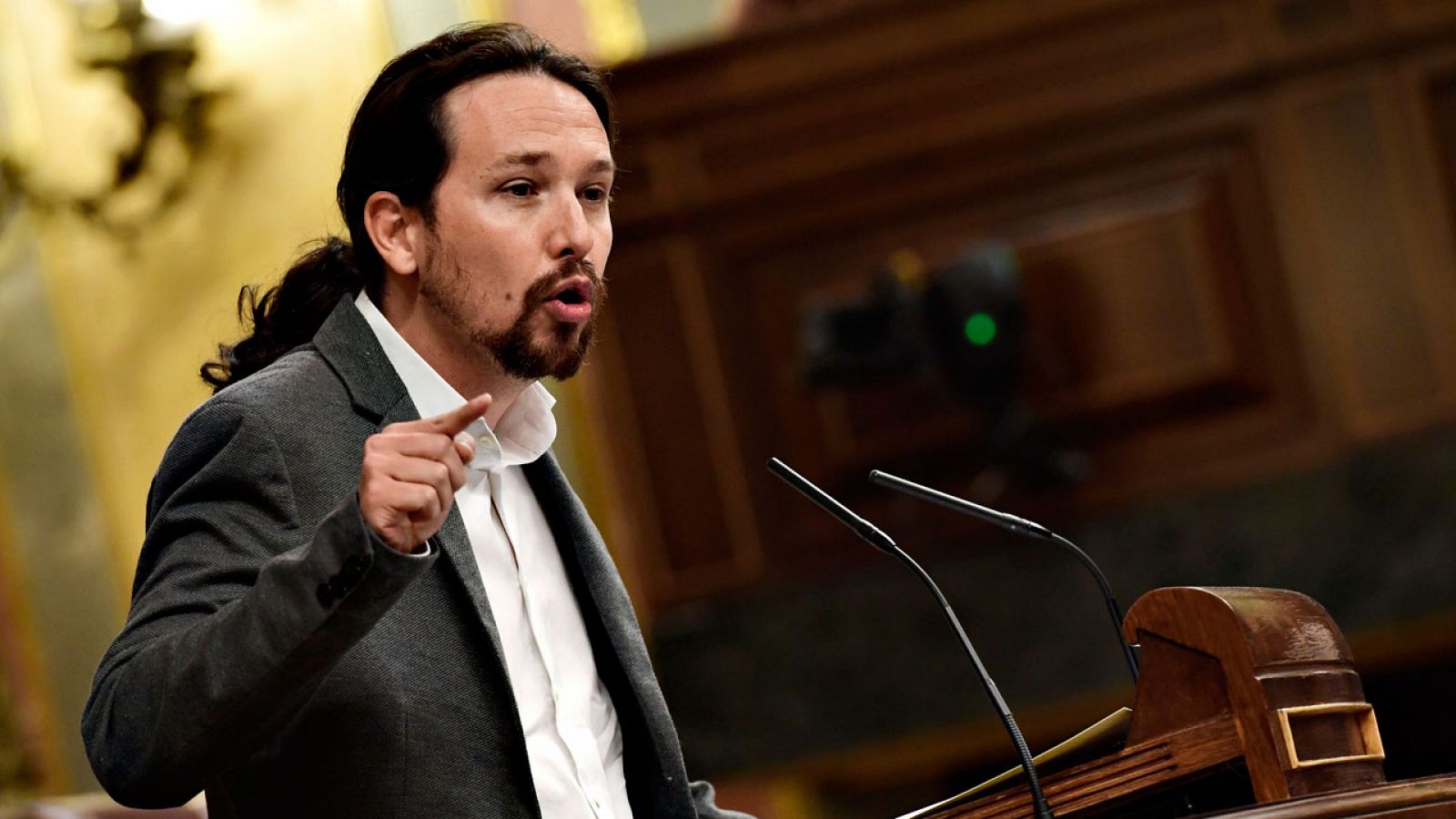 El portavoz de Unidos Podemos, Pablo Iglesias, durante su replica a Mariano Rajoy en el Congreso