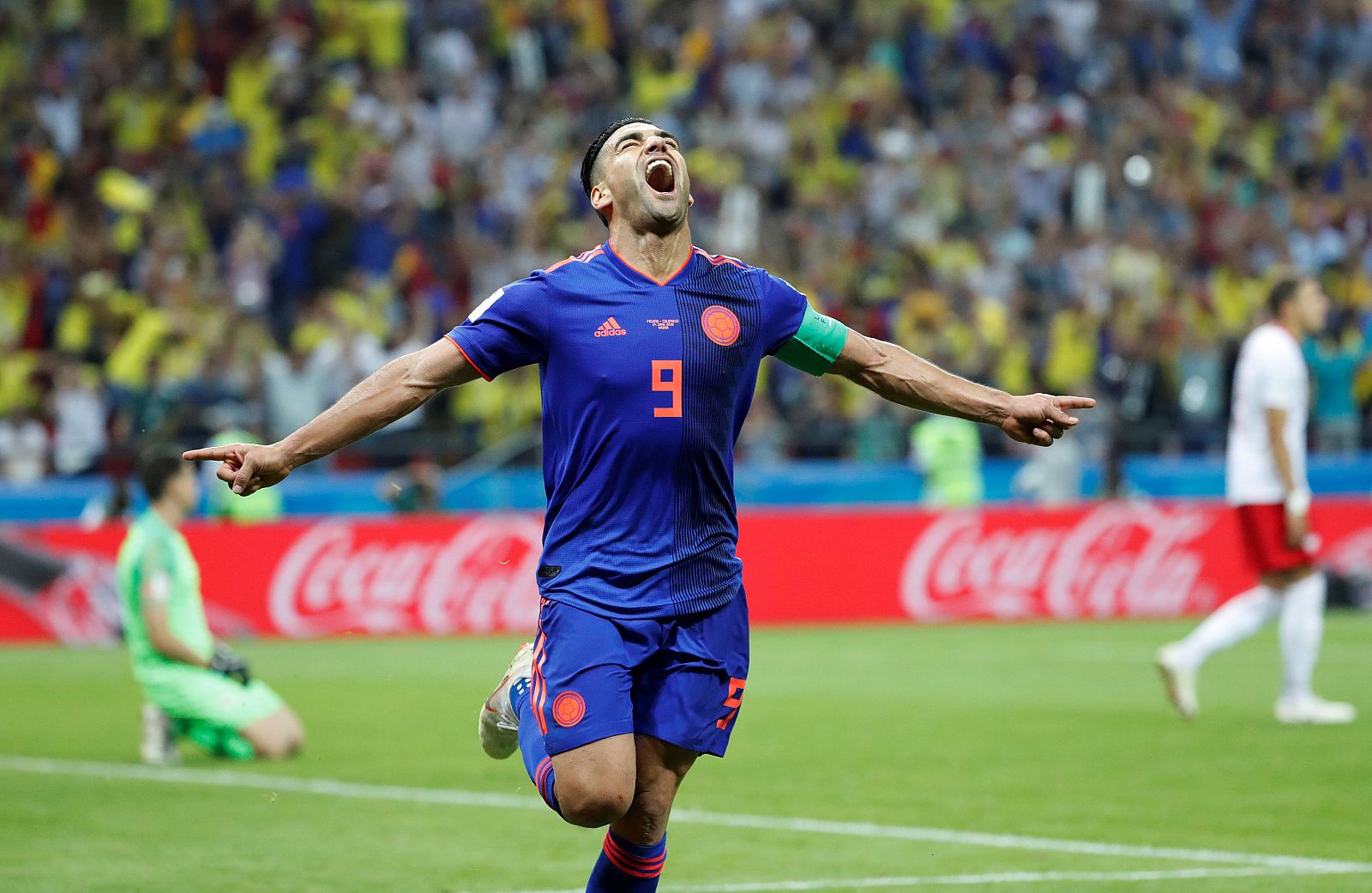El delantero Radamel Falcao celebra el segundo gol de Colombia a Polonia.