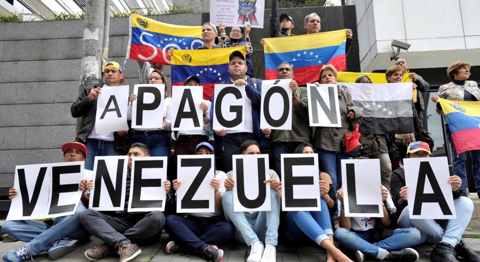 Venezuelan citizens living in Bogota protest against Venezuela's President Maduro and the power outage in Venezuela