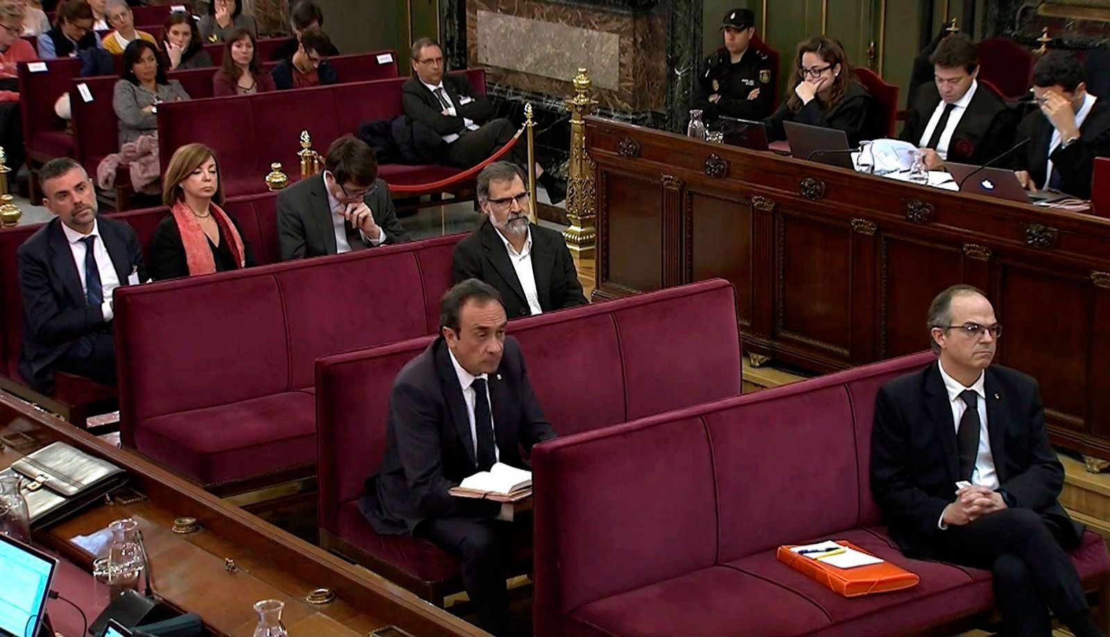 El exconseller de Presidencia, Jordi Turull, el exconseller de Territorio Josep Rull y el expresidente de la Asamblea Nacional Catalana (ANC), Jordi Sànchez, durante la sesión del juicio del 'procés' en el Tribunal Supremo de Madrid.