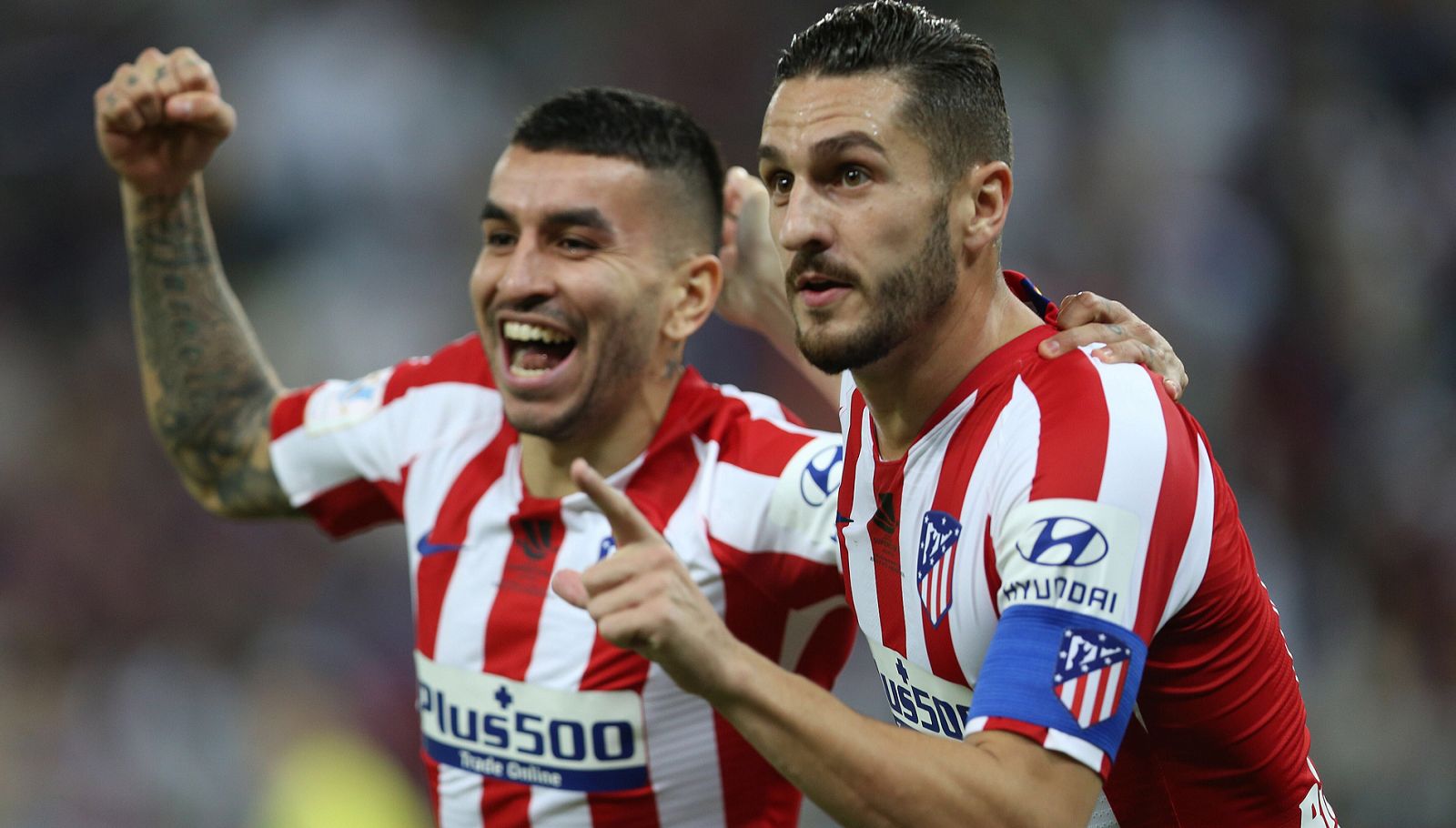Correa y Koke celebran un gol del Atlético.