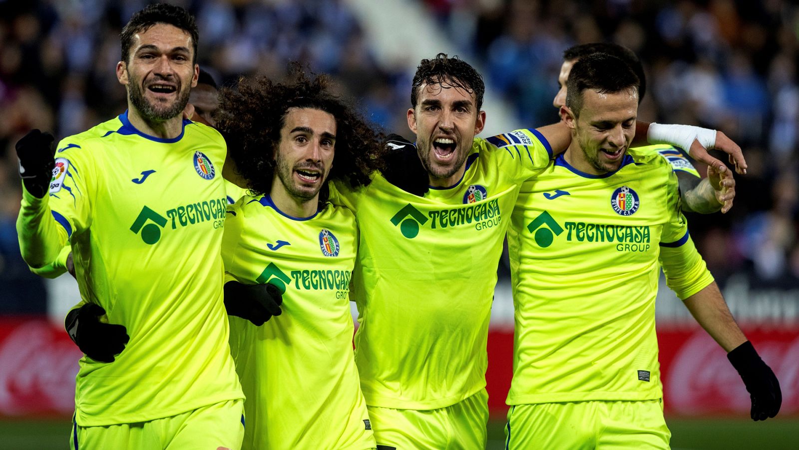Los jugadores del Getafe celebran uno de sus goles al Leganés.