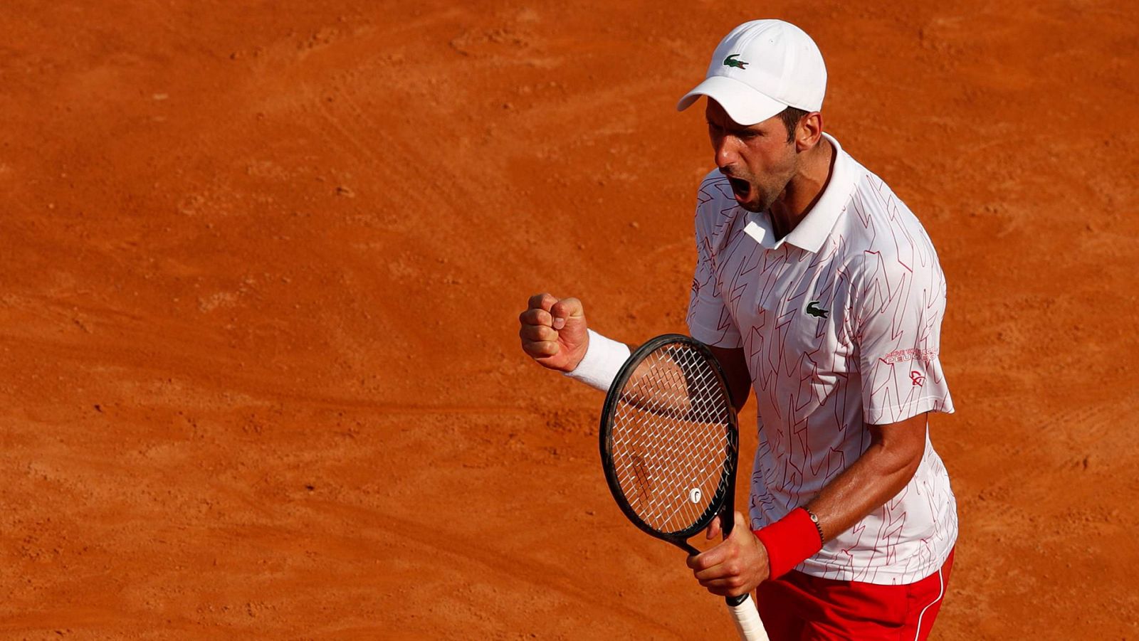 El serbio Novak Djokovic celebra un punto ante Casper Ruud.