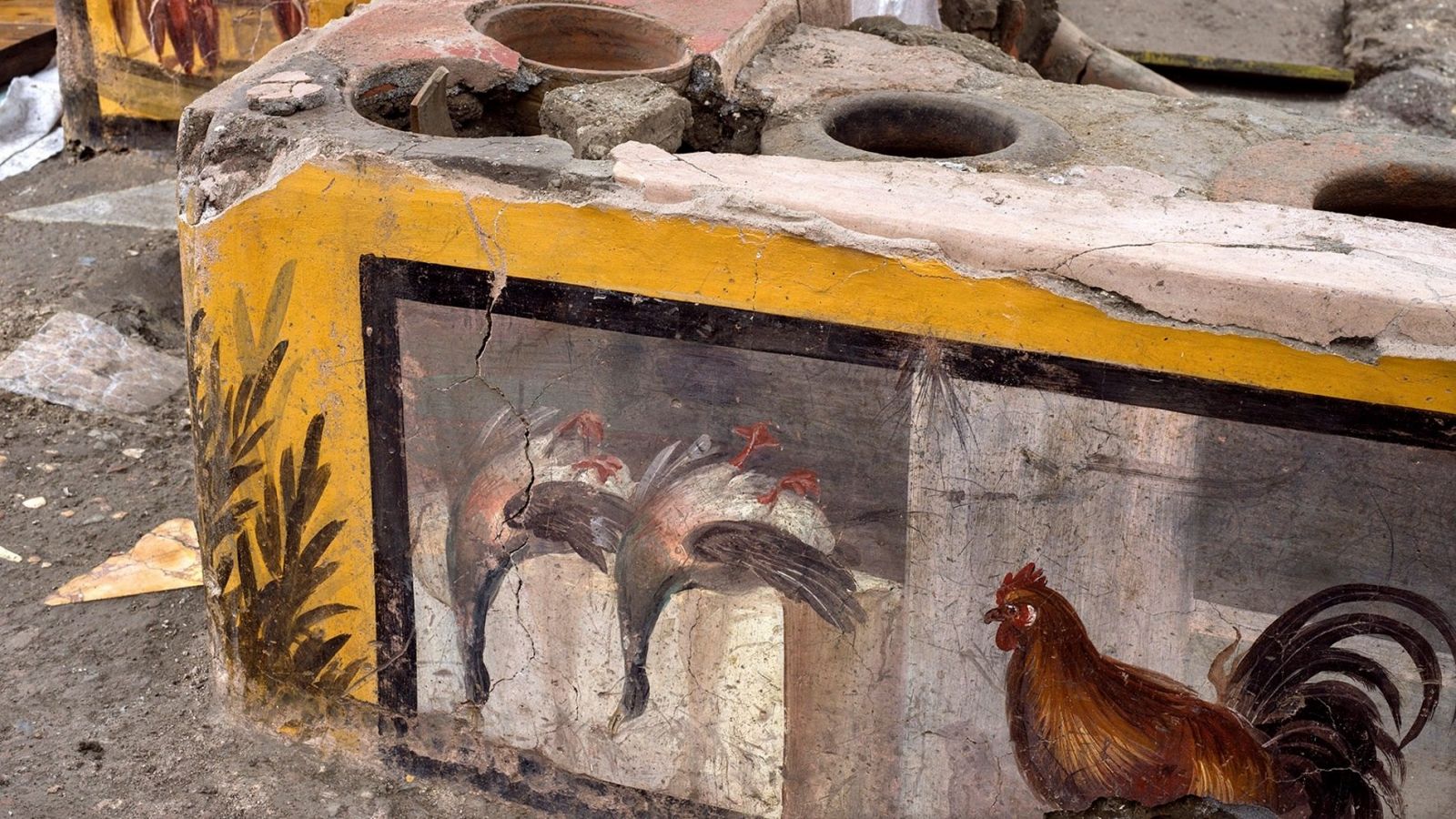 Detalle de la decoración descubierta en un termopolio, en el área arqueológica de Pompeya