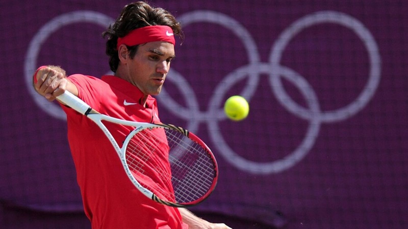 Federer disputa un partido frente a Andy Murray en los Juegos de Londres 2012, su última participación