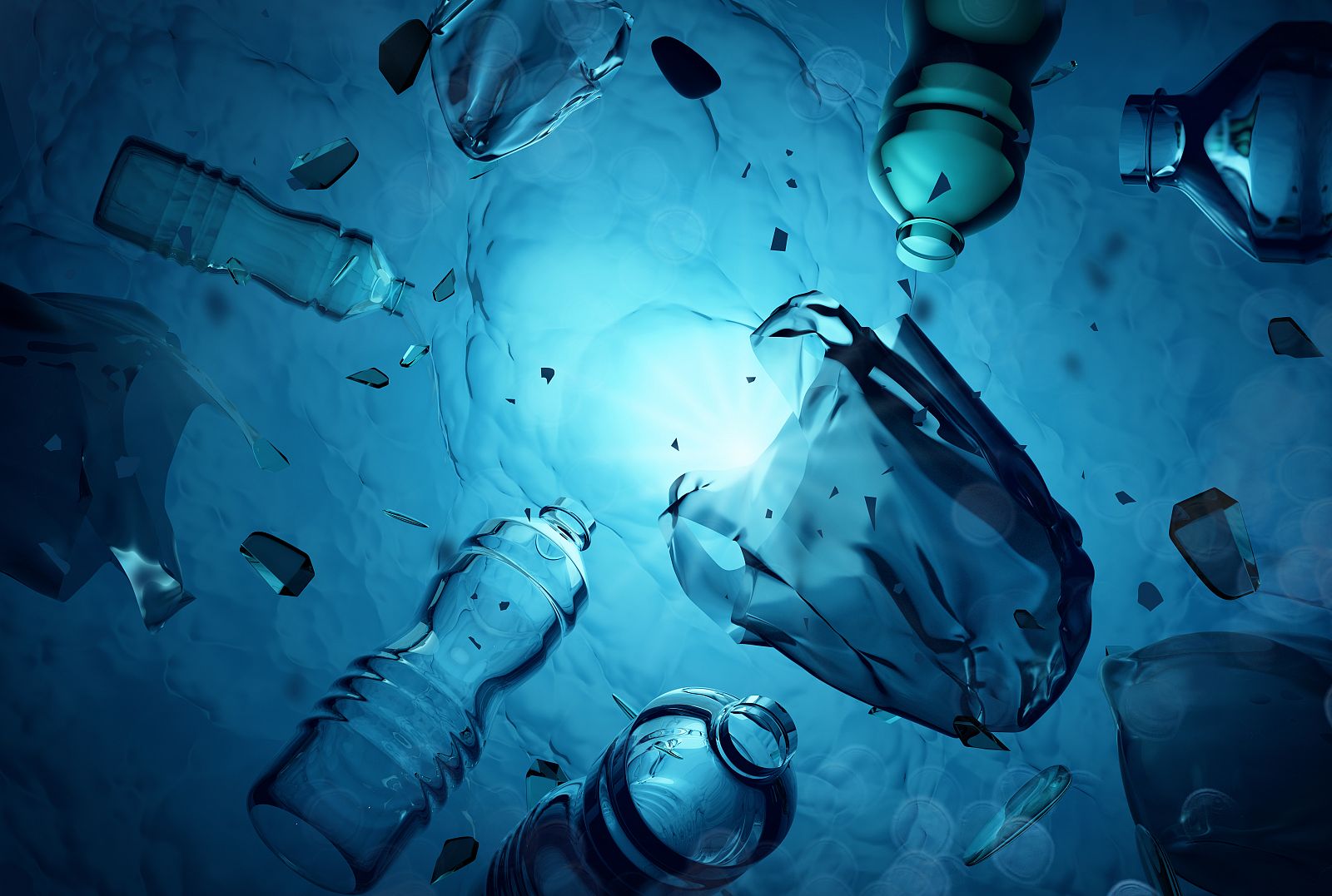 Varias botellas de plástico flotando en el océano