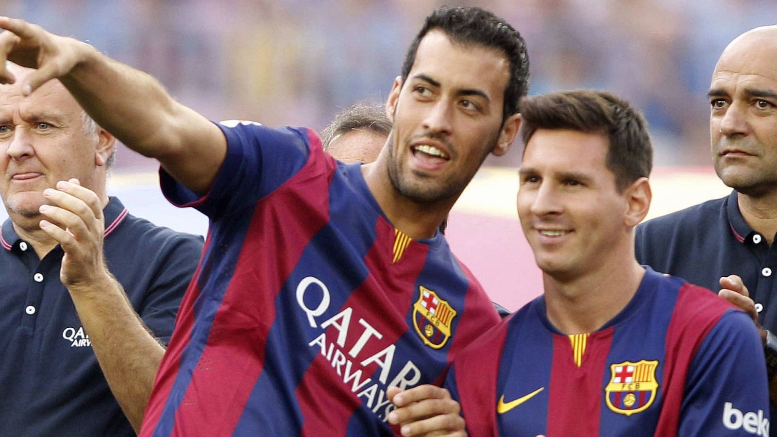 Busquets y Messi, con la camiseta del Barcelona en 2014