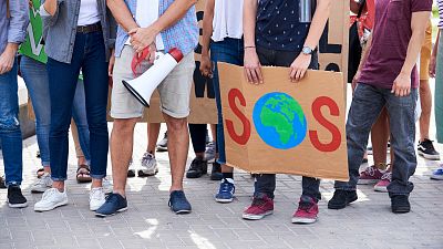 Un grupo de manifestantes contra el cambio climático Un grupo de manifestantes contra el cambio climático