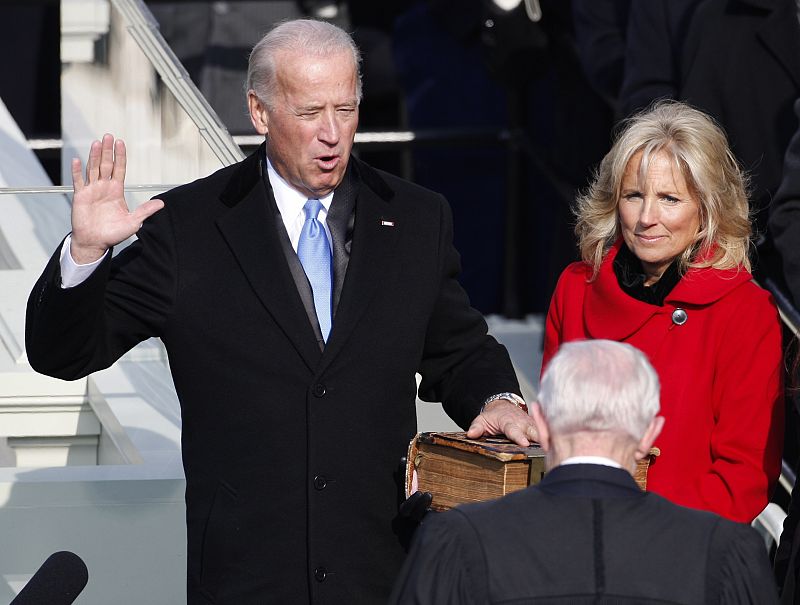 U.S. Vice President Joe Biden takes the oath of office as wife Jill looks on during inauguration ceremony in Washington