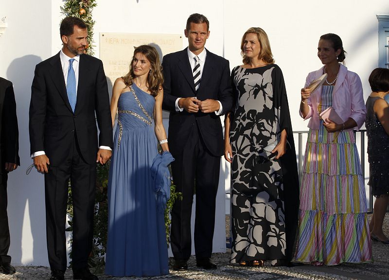 Spain's Crown Prince Felipe, Princess Letizia, Inaki Urdangarin and his wife Infanta Cristina and the Infanta Elena arrive at Agios Nikolaos church to attend the wedding ceremony of Prince Nikolaos and Tatiana Blatnik on the island of Spetses