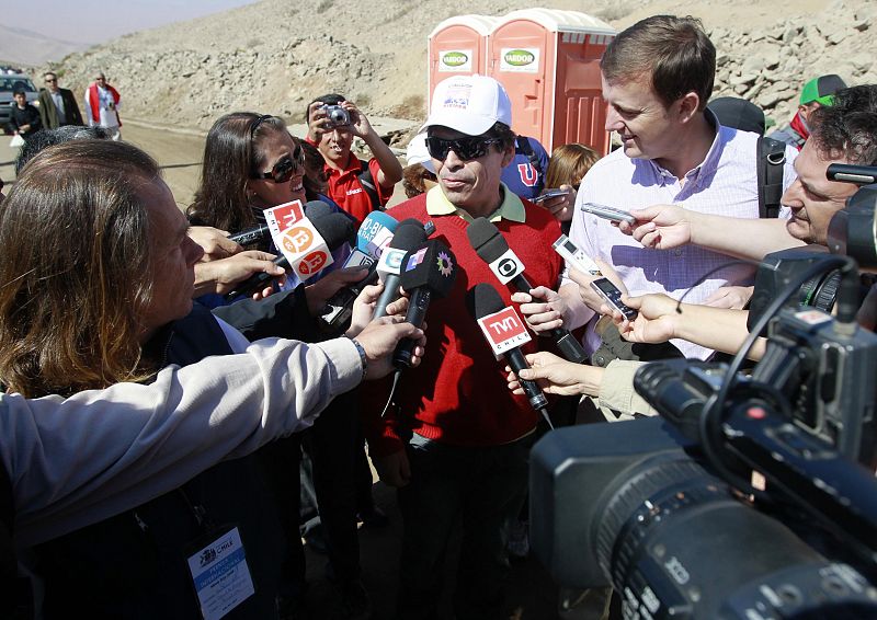 Rescued Chilean miner Dario Segovia answers a question as he arrives at the San Jose mine