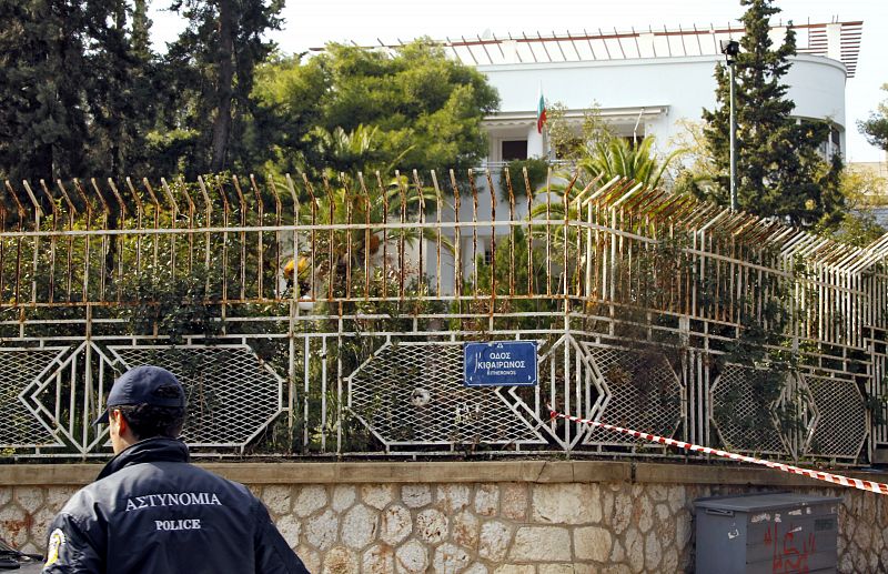 Greek policeman stands guard outside the Bulgarian Embassy in Athens