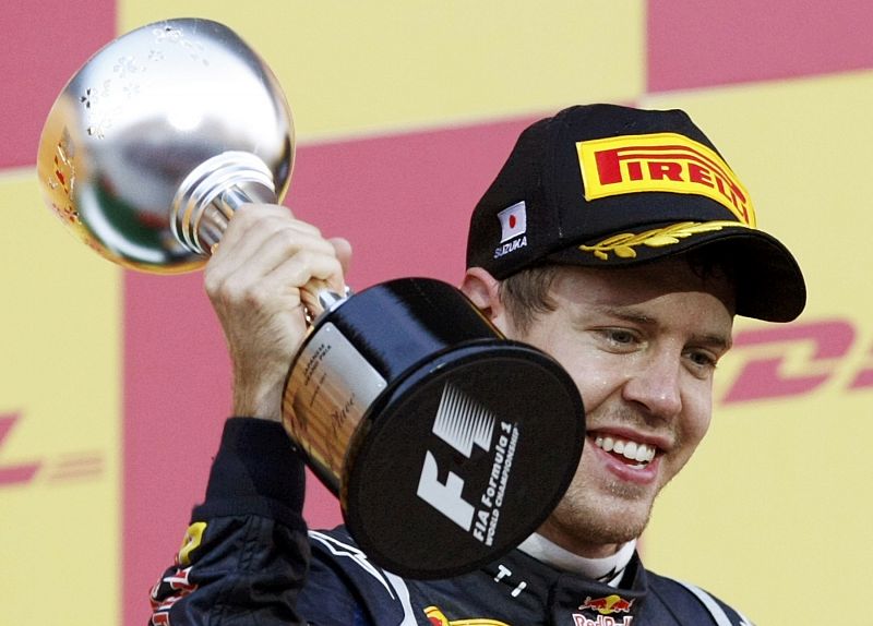Vettel celebra su tercer puesto en el GP de Japón, que le certifica el campeonato