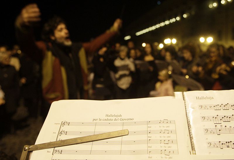 A music sheet " Hallelujah for the govern breakdown"  is seen in front of Presidential palace in Rome