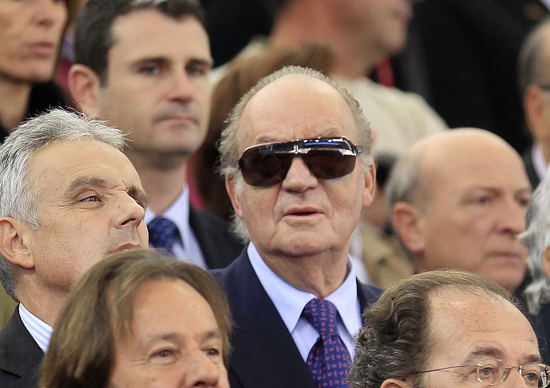 Spain's King Juan Carlos attends the Davis Cup final reverse singles rubber in Seville