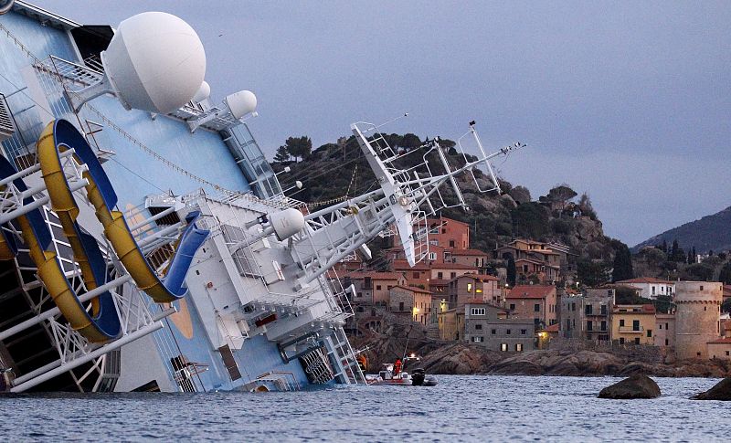 A view shows the capsized Costa Concordia cruise ship lying on its side at Giglio island