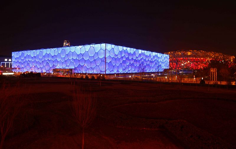 China's National Stadium and National Aquatics Center are seen before Earth Hour in Beijing