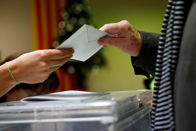 A man casts his ballot in Catalonia's regional elections at a polling station in Barcelona