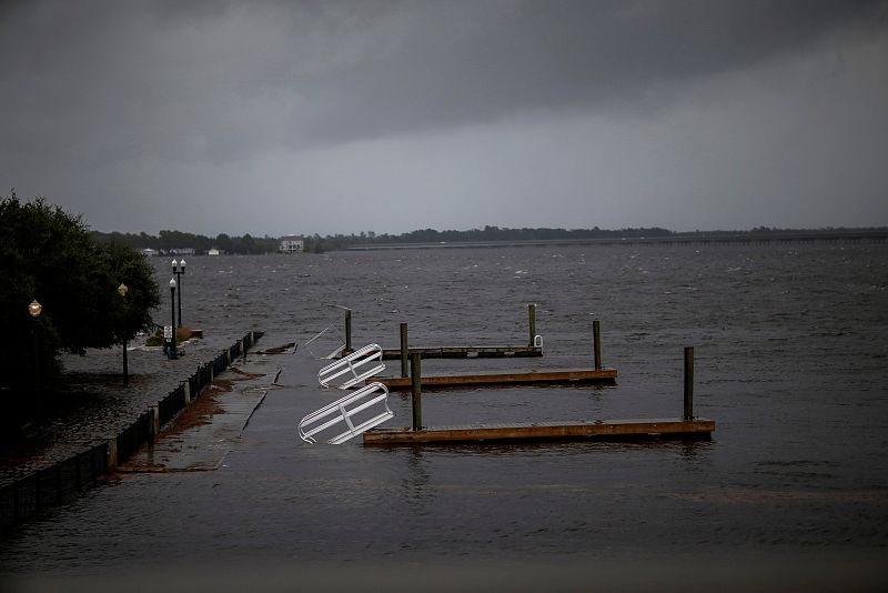 Docks broken by water from Neuse River are seen floating as Hurricane Florence comes ashore in New Bern, North Carolina