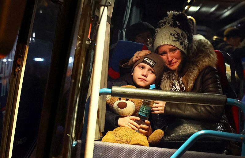 Refugees fleeing the Russian invasion wait for transit in Lviv