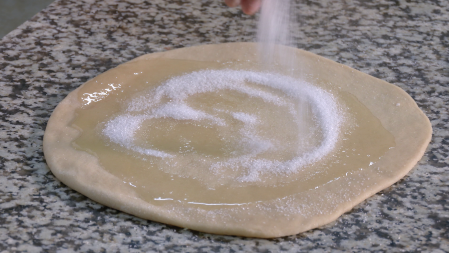 Espolvorear azúcar por encima