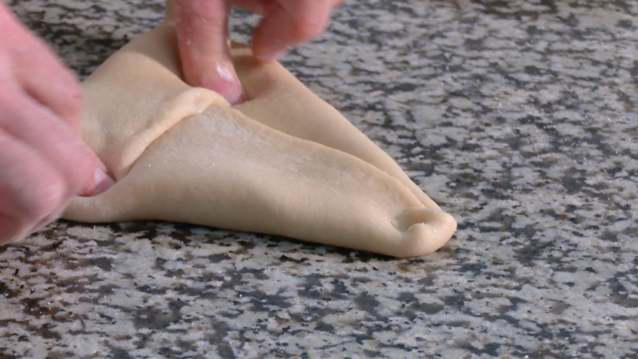 Cerrarlo en forma de triángulo