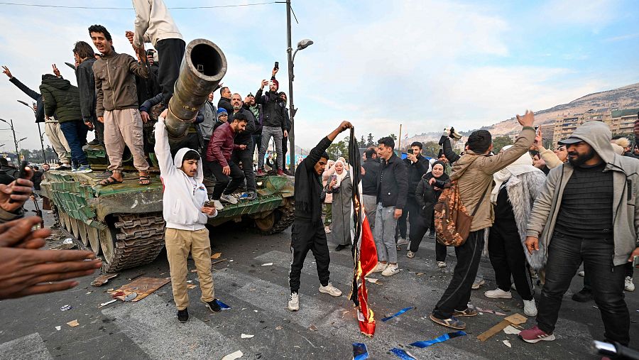 Celebración de la victoria rebelde en la plaza de los Omeyas de Damasco