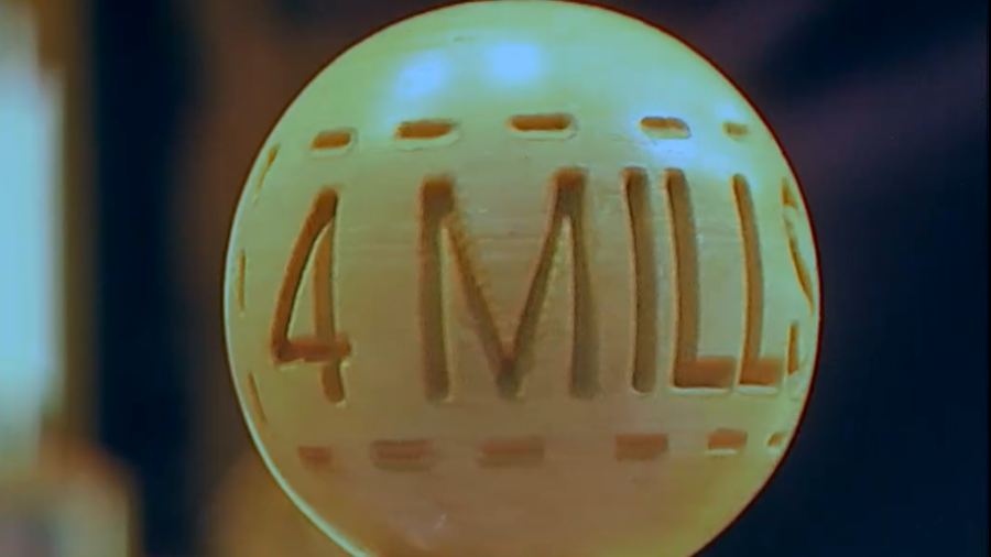 Bola de lotería amarilla con el número 