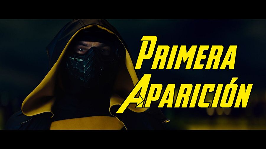 Imagen promocional de un cómic: personaje encapuchado con máscara metálica, texto 'PRIMERA APARICIÓN' en amarillo sobre fondo oscuro.