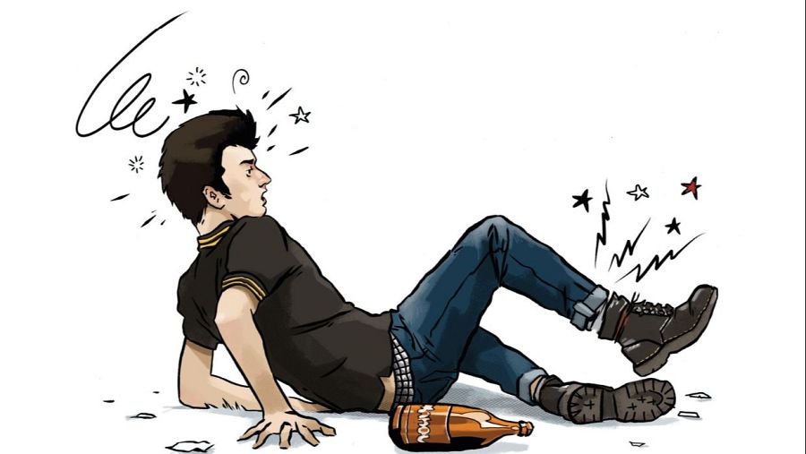 Hombre caído en viñeta de cómic, con camiseta negra, vaqueros y botas.  Restos de botella rota y efectos de impacto cercanos.
