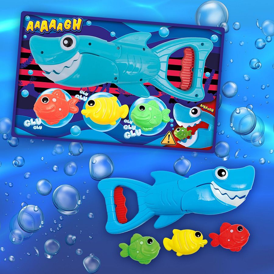 Tiburón azul con boca articulada que atrapa tres peces de colores.  Asa roja.  Incluye onomatopeyas "AAAAGH" y "GLU".