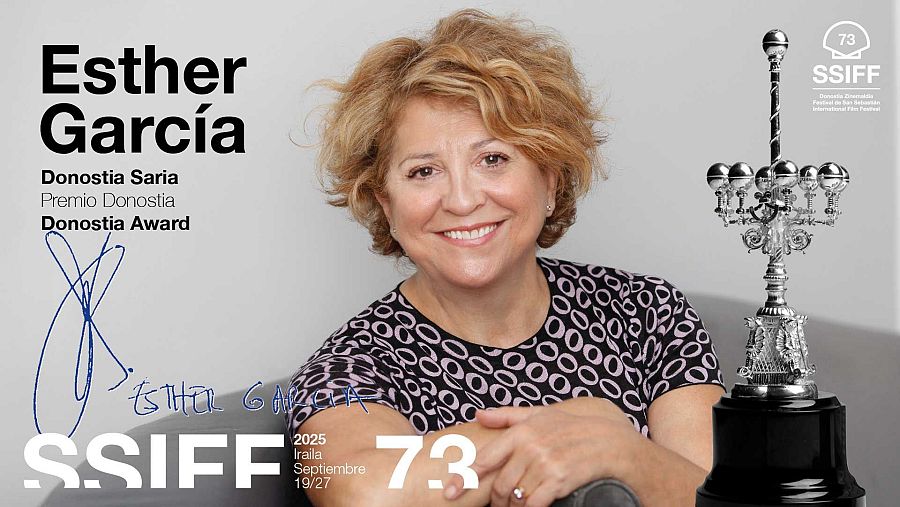 Retrato de Esther García con el trofeo del Premio Donostia.  Se incluyen detalles del festival: logo SSIFF 73, fechas 19-27 Septiembre 2025, nombres del premio en tres idiomas.
