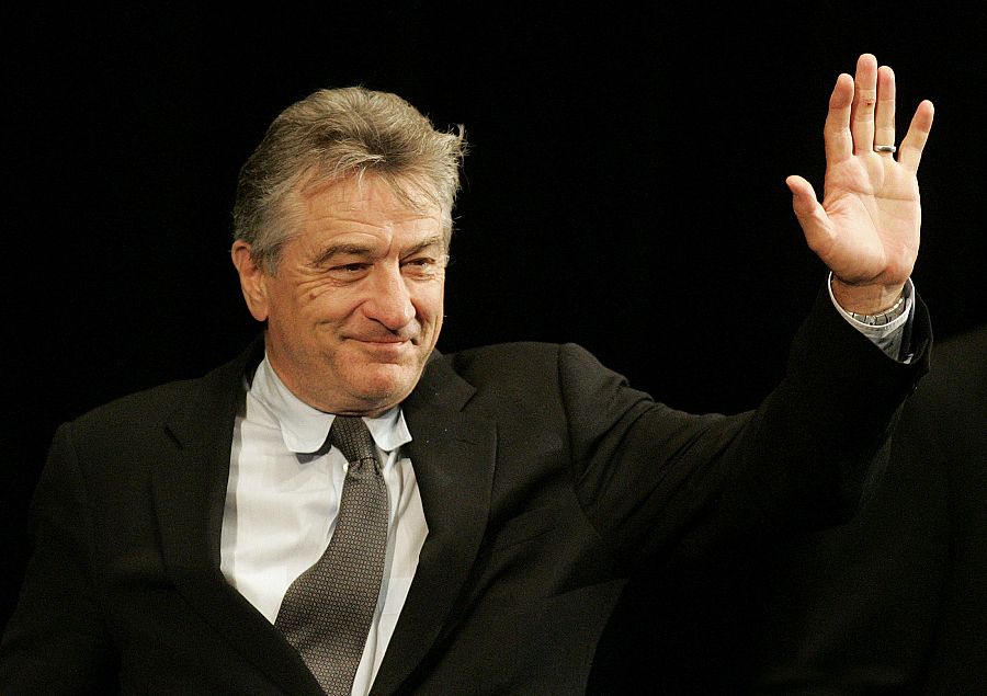 Robert De Niro greets spectators before a screening of the movie 