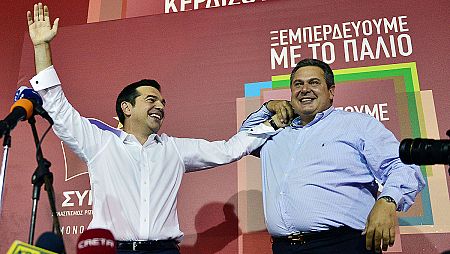 El líder de Syriza, Alexis Tsipras (izda.), y el de Griegos Independientes, Panos Kamenos, tras la victoria en las elecciones generales griegas
