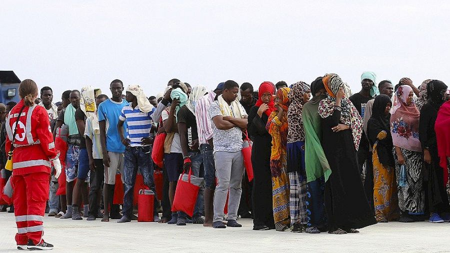 Migrantes en el puerto siciliano de Augusta, en Italia, el 25 de agosto de 2015. REUTERS/Antonio Parrinello