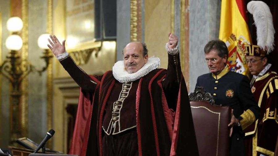  Un cartel que pide el fin del TTIP, delante de una imagen de Obama y Merkel