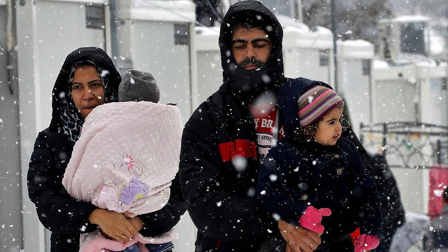 Refugiados sirios en un campo del norte de Atenas, en Grecia