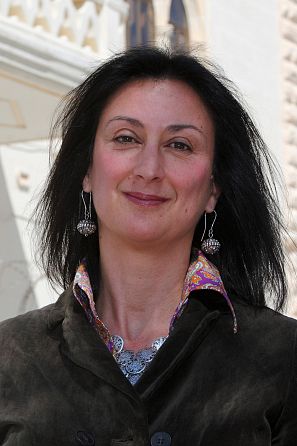 Maltese investigative journalist Daphne Caruana Galizia poses outside the Libyan Embassy in Valletta