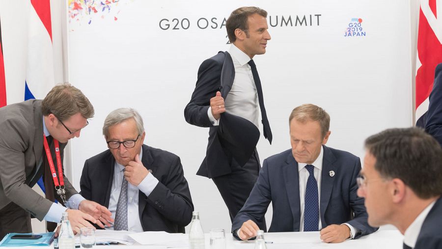 El presidente de la Comisión, Juncker, el de Francia, Macron, y el del Consejo, Tusk, durante la cumbre del G20 en Osaka.