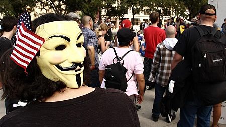 Careta de Anonymous con bandera de Estados Unidos.