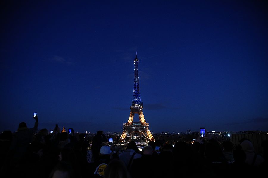 Eiffel Tower lit up with Ukrainian flag colours