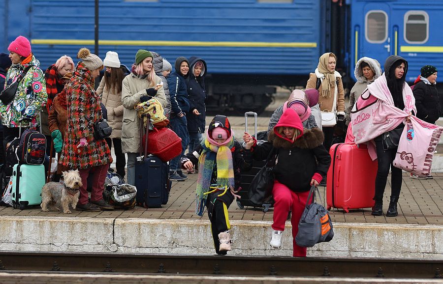 Refugees fleeing the Russian invasion wait for trains to Poland in Lviv