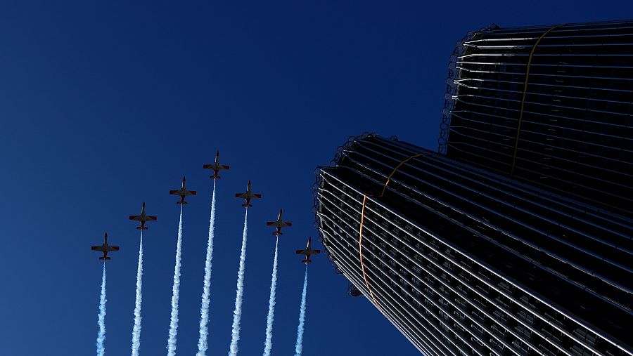 La Patrulla Águila participa en el desfile del Día de la Fiesta Nacional.