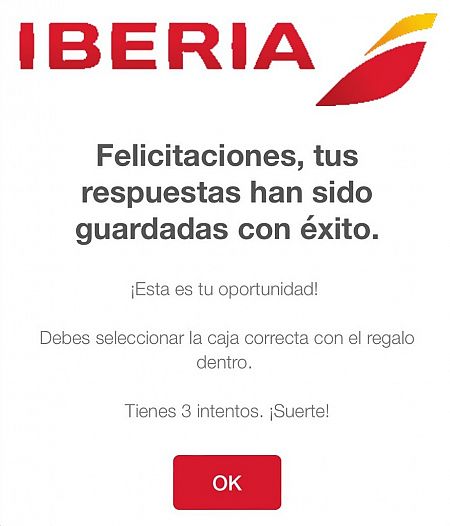 Captura del mensaje fraudulento de Iberia en el que te pide hagas clic y después te ofrece la opción de seleccionar la caja correcta para obtener el regalo