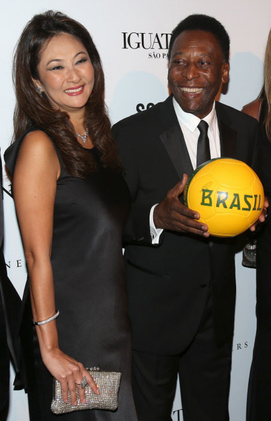 Pelé y su tercera esposa, Marcia Aoki, en un evento de 2013