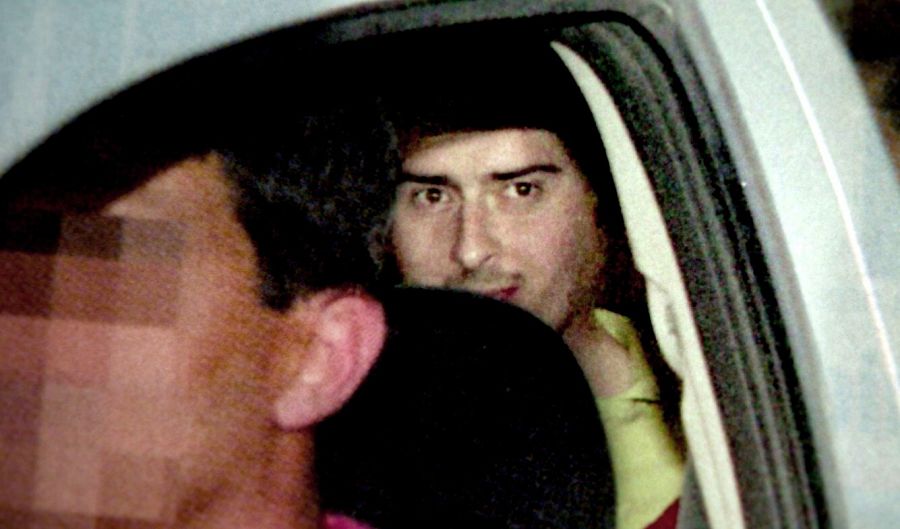 El Asesino de la Baraja, Alfredo Galán Sotillo, en un coche policial.