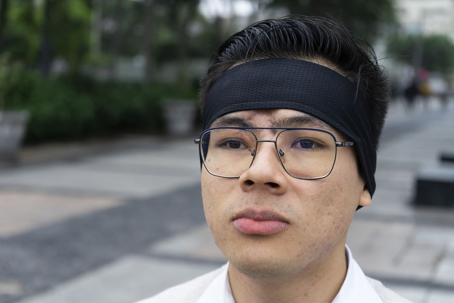 Renato Sebastián Murillo Reyes, de 22 años, víctima de las protestas, frente al Palacio de Justicia de Lima